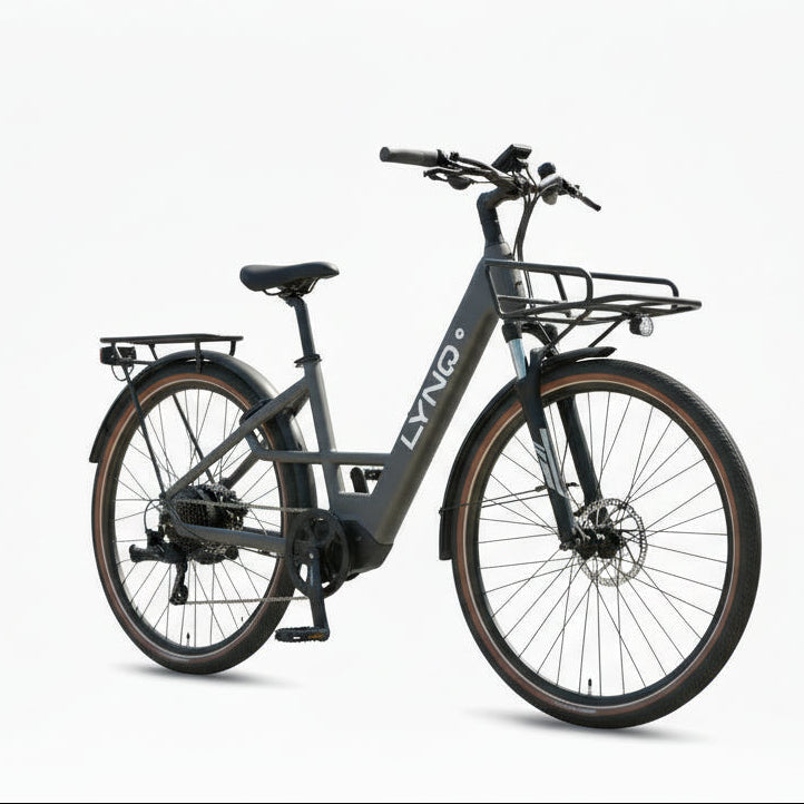 The LYNQ Current e-bike is shown in warm grey with a front cargo rack.